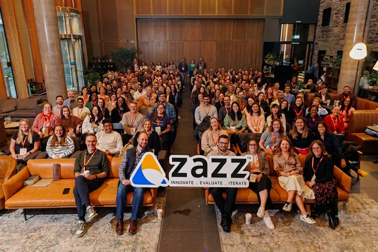 Zazz employees gathered together in the office lounge